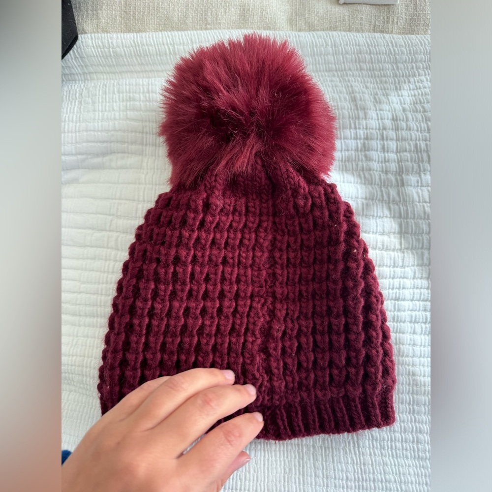 Red beanie with Pom on top!